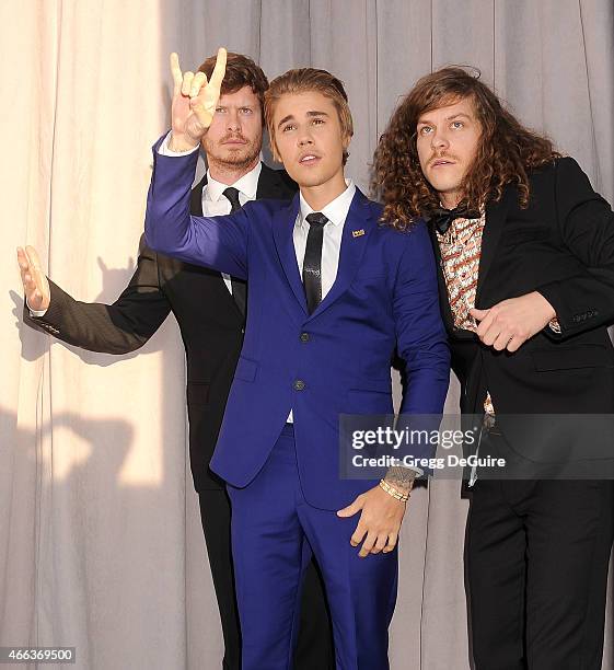 Actor Anders Holm, honoree Justin Bieber and actor Blake Anderson arrive at the Comedy Central Roast of Justin Bieber on March 14, 2015 in Los...