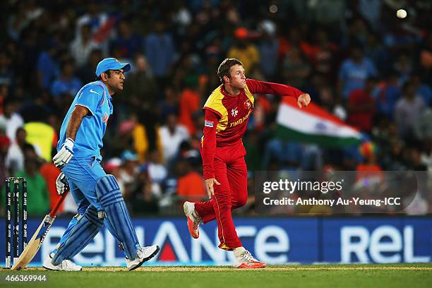 Sean Williams of Zimbabwe bowls during the 2015 ICC Cricket World Cup match between India and Zimbabwe at Eden Park on March 14, 2015 in Auckland,...