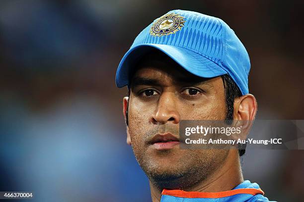 Dhoni of India looks on during the 2015 ICC Cricket World Cup match between India and Zimbabwe at Eden Park on March 14, 2015 in Auckland, New...