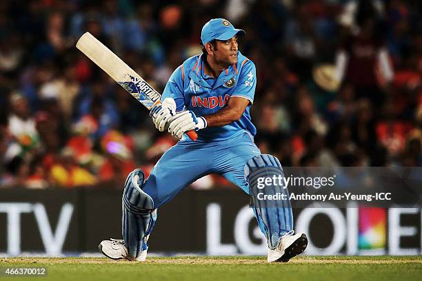 Dhoni of India bats during the 2015 ICC Cricket World Cup match between India and Zimbabwe at Eden Park on March 14, 2015 in Auckland, New Zealand.