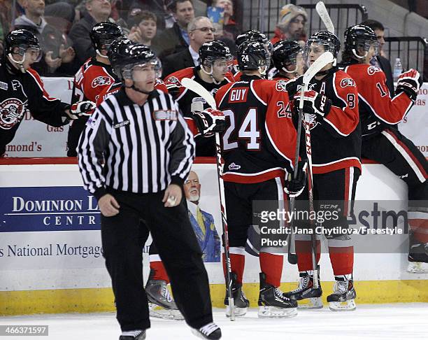 Ryan Van Stralen of the Ottawa 67's celebrates his second period goal against the Oshawa Generals with team mate Nevin Guy during an OHL game at...