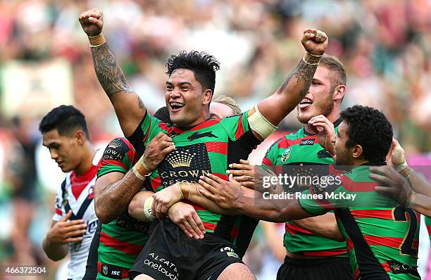 Issac Luke of the Rabbitohs celebrates his try during the round two NRL match between South Sydney Rabbitohs and the Sydney Roosters at ANZ Stadium...