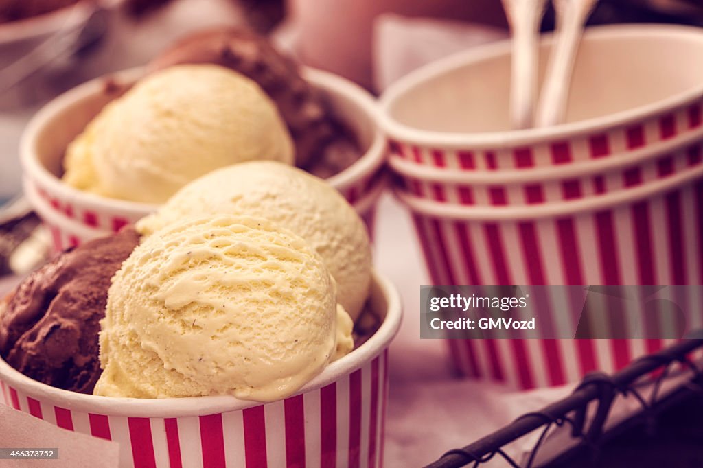 Vanilla, chocolate ice cream in paper cups