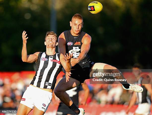 Liam Jones of the Blues flies for a mark during the NAB Challenge AFL match between the Collingwood Magpies and the Carlton Blues at Queen Elizabeth...