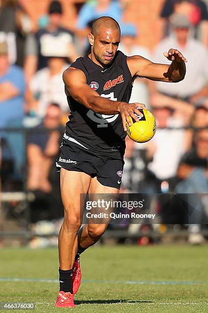 Chris Yarran of the Blues kicks during the NAB Challenge AFL match between the Collingwood Magpies and the Carlton Blues at Queen Elizabeth Oval on...