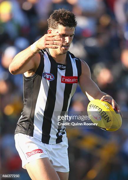 Scott Pendlebury of the Magpies kicks during the NAB Challenge AFL match between the Collingwood Magpies and the Carlton Blues at Queen Elizabeth...