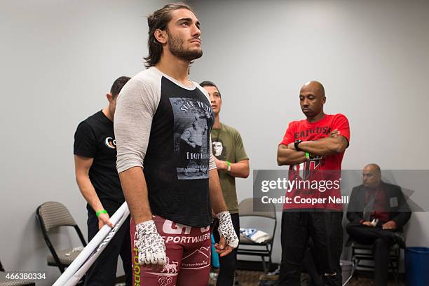 Elias Theodorou prepares backstage before his fight against Roger Narvaez during UFC 185 at the American Airlines Center on March 14, 2015 in Dallas,...