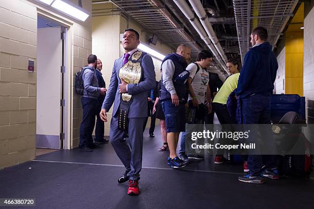 Rafael Dos Anjos walks backstage after defeating Anthony Pettis and becoming the new UFC lightweight champion during UFC 185 at the American Airlines...