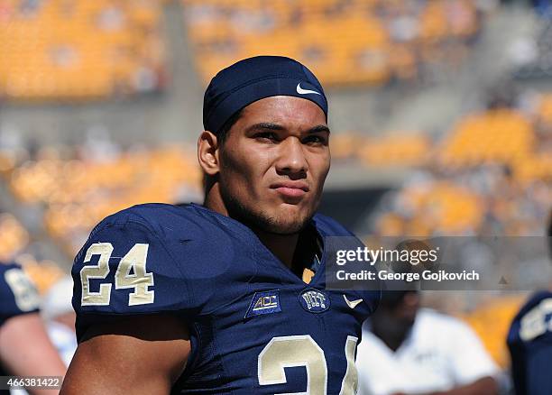 Tailback James Conner of the University of Pittsburgh Panthers looks on from the field before a college football game against the University of Akron...