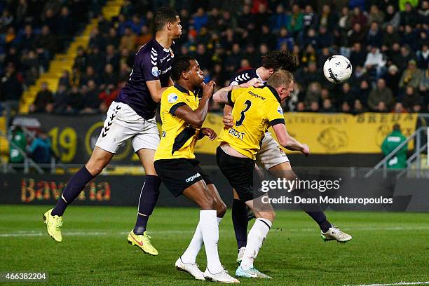 Felitciano Zschusschen and Henrico Drost of NAC battle for the header with Mawouna Kodjo Amevor and Bart Vriends of Go Ahead Eagles during the Dutch...