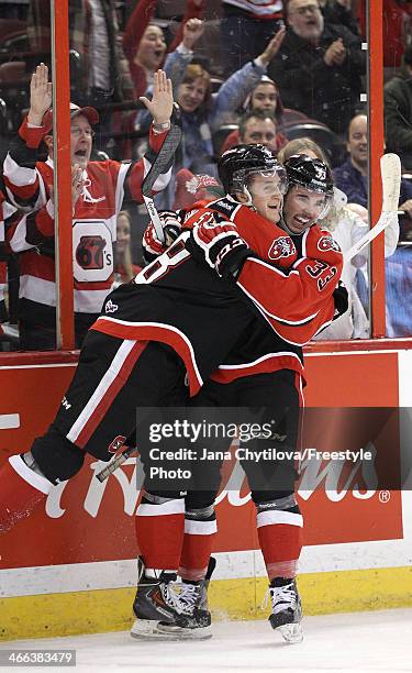 Ryan Van Stralen of the Ottawa 67's celebrates his third period goal with team mate Erik Bradford and completes his hat trick against the Oshawa...