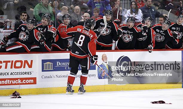 Ryan Van Stralen of the Ottawa 67's celebrates his third period goal and hat trick against the Oshawa Generals with team mates Connor Brown, Sam...