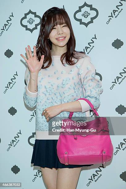 Sunny, bag detail, of South Korean girl group Girls' Generation attends the photocall for 'orYANY' Flagship Store Opening at Hyundai Department Store...