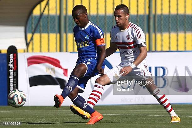 Zamalek's Hazem Emam vies with a Rayon Sports' player during their Group A CAF Champions League football match Egypt's Zamalek versus Rwanda's Rayon...