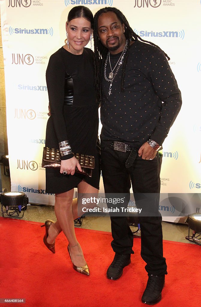 Rapper Saukrates and Alana Wyatt arrive at the JUNO Gala Dinner