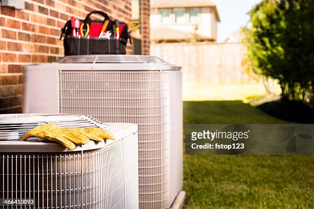 service industry:  work tools on air conditioners. outside residential home. - equipment stock pictures, royalty-free photos & images
