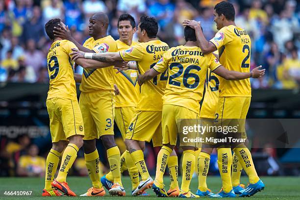 Miguel Layun, , celebrates after scoring with teammates during a match between America and Atlante as part of the Clausura 2014 Liga MX at Azteca...