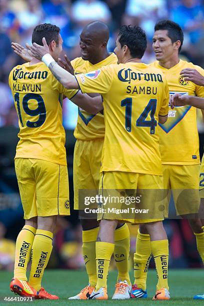 Miguel Layun, , celebrates after scoring with teammates during a match between America and Atlante as part of the Clausura 2014 Liga MX at Azteca...