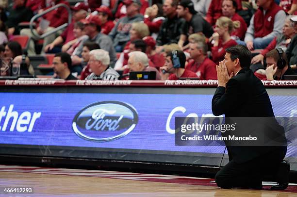 Head coach Ken Bone of the Washington State Cougars directs his players from the sideline against the Washington Huskies during the first half of the...