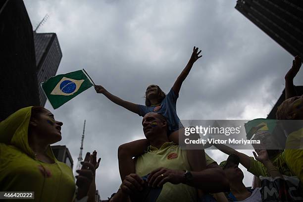 Anti-government protesters march along Avenida Paulista on March 15, 2015 in Sao Paulo, Brazil. Protests across the country were held today against...