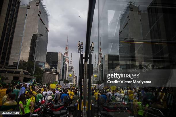 Anti-government protesters march along Avenida Paulista on March 15, 2015 in Sao Paulo, Brazil. Protests across the country were held today against...