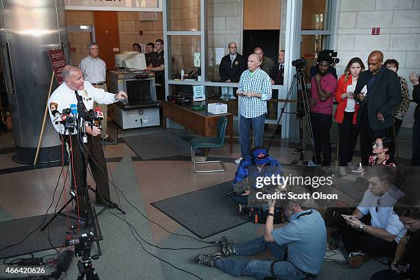 St. Louis County Police Chief Jon Belmar takes questions after Robert "Bob" McCulloch, the Prosecuting Attorney for St. Louis County, announced the...