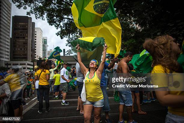 Anti-government protesters march along Avenida Paulista on March 15, 2015 in Sao Paulo, Brazil. Protests across the country were held today against...