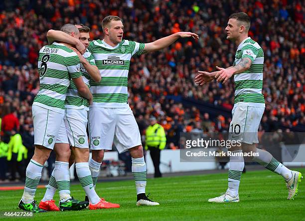 James Forrest of Celtic celebrates his goal with team mates Scott Brown, Anthony Stokes, John Guidetti during the Scottish League Cup Final between...