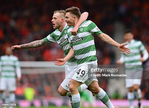 James Forrest of Celtic celebrates his goal with team mate John Guidetti during the Scottish League Cup Final between Dundee United and Celtic at...