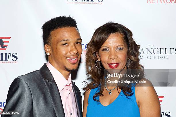 Actor Penny Johnson Jerald and son attends the salute to heroes service gala to benefit The National Foundation For Military Family Support at The...