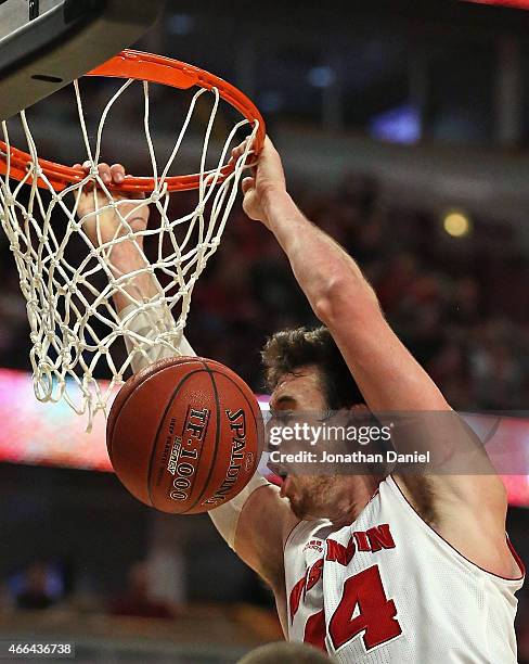 Frank Kaminsky of the Wisconsin Badgers dunks the ball against the Michigan State Spartans during the Championship game of the 2015 Big Ten Men's...