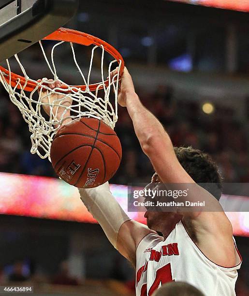 Frank Kaminsky of the Wisconsin Badgers dunks the ball against the Michigan State Spartans during the Championship game of the 2015 Big Ten Men's...
