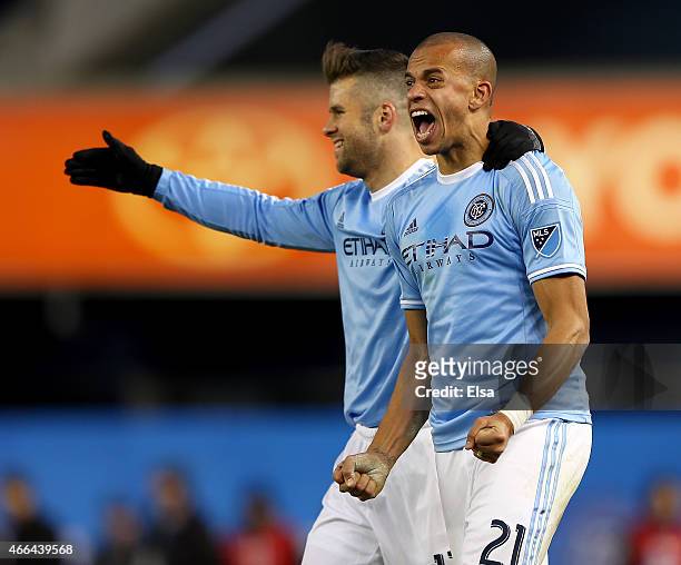 Jason Hernandez and Chris Wingert of New York City FC celebrate the win after the inaugural game of the New York City FC at Yankee Stadium on March...