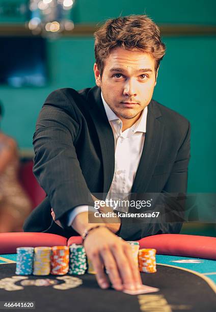 professional poker player - casino tokens checks or chips stock pictures, royalty-free photos & images