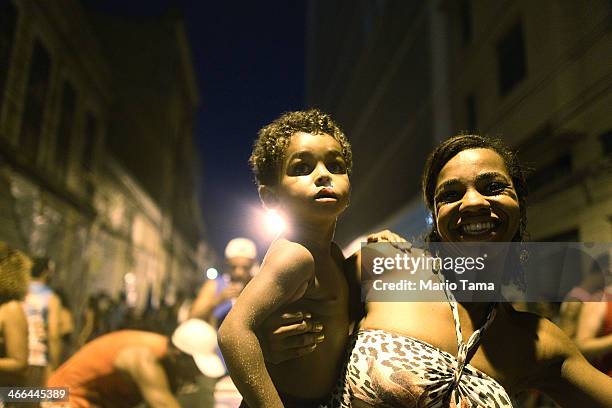 Revelers march in the first street parade of the 2014 Carnival season through the historic Afro-Brazilian port district during the Circuito da Liga...