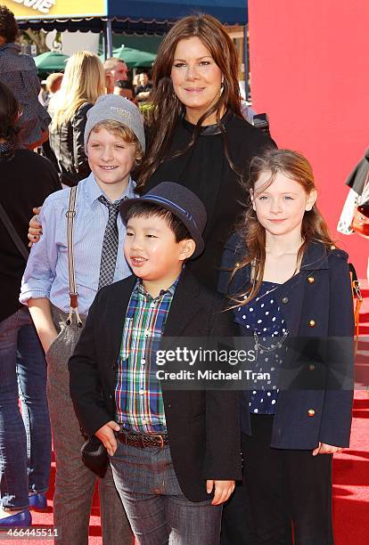Marcia Gay Harden and her children arrive at the Los Angeles premiere of "The Lego Movie" held at Regency Village Theatre on February 1, 2014 in...