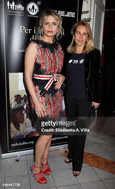 Isabella Ferrari and Mariavittoria Rava attend the charity dinner organized by Fondazione Rava for the children of Haiti at Villa Letitia on March...