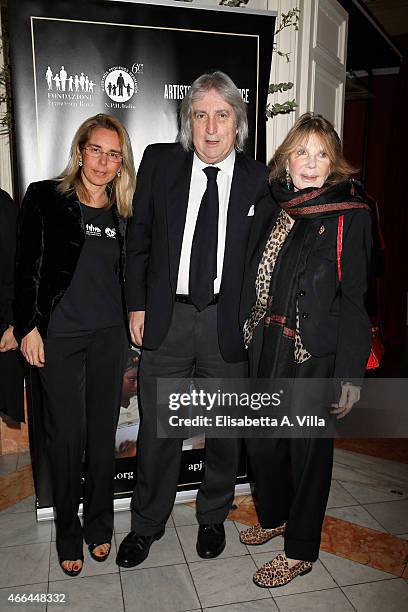 Mariavittoria Rava, Enrico Vanzina and Federica Burger attend the charity dinner organized by Fondazione Rava for the children of Haiti at Villa...