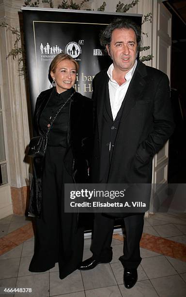 Paolo Sorrentino and wife Daniela D'Antonio attend the charity dinner organized by Fondazione Rava for the children of Haiti at Villa Letitia on...