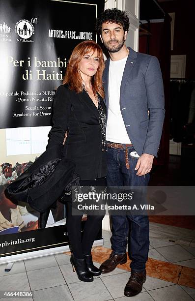 Giuliana De Sio and fiancee Mario De Felice attend the charity dinner organized by Fondazione Rava for the children of Haiti at Villa Letitia on...