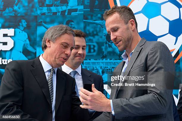 David Traktovenko presents Sydney FC Football Hall Of Fame recipient Clint Bolton his pin during the Sydney FC 10 Year Anniversary Lunch at Allianz...