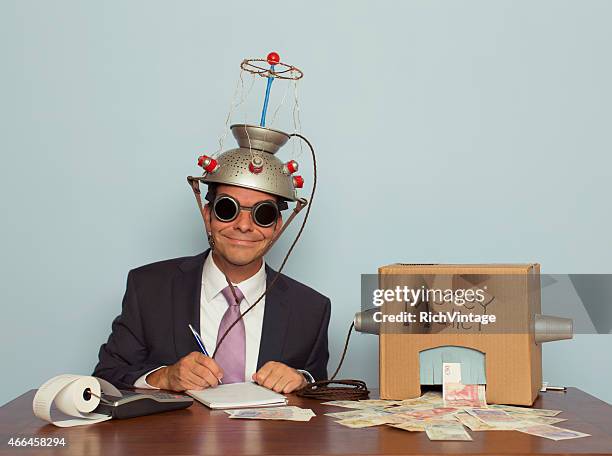 businessman with mind reading machine makes money - resourceful stock pictures, royalty-free photos & images