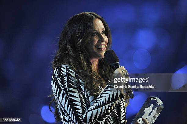 Alanis Morissette is presented an award at the 2015 JUNO Awards at FirstOntario Centre on March 15, 2015 in Hamilton, Canada.