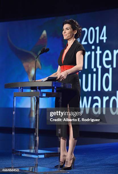 Presenter Julianna Margulies speaks onstage during the 2014 Writers Guild Awards L.A. Ceremony at J.W. Marriott at L.A. Live on February 1, 2014 in...