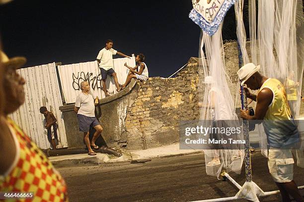 Revelers march in the first street parade of the 2014 Carnival season through the historic Afro-Brazilian port district during the Circuito da Liga...