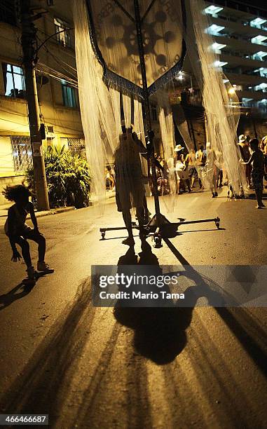 Revelers march in the first street parade of the 2014 Carnival season through the historic Afro-Brazilian port district during the Circuito da Liga...