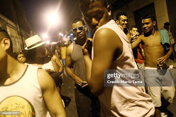 Revelers march in the first street parade of the 2014 Carnival season through the historic Afro-Brazilian port district during the Circuito da Liga...