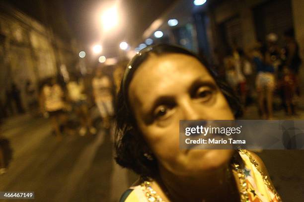 Reveler marches in the first street parade of the 2014 Carnival season through the historic Afro-Brazilian port district during the Circuito da Liga...