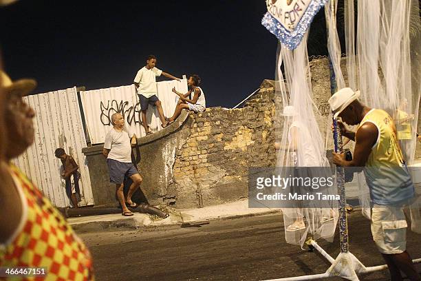 Revelers march in the first street parade of the 2014 Carnival season through the historic Afro-Brazilian port district during the Circuito da Liga...