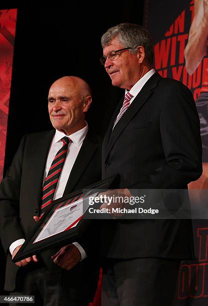 Graeme Moss receives a life membership award from chairman cduring the Essendon Bombers 2015 AFL season launch at Luminare on March 16, 2015 in...